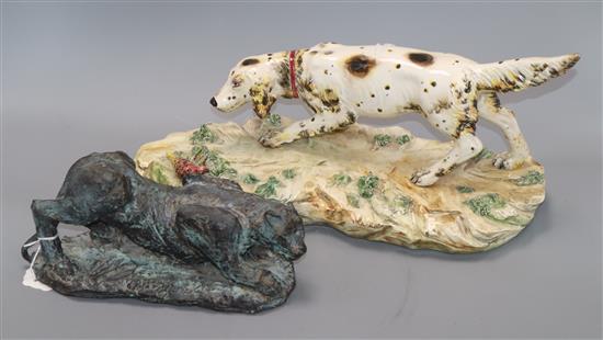 A Continental ceramic figure of a hound, on naturalistic plinth base and a stoneware model of a big cat